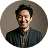 cheerful man in blazer.png